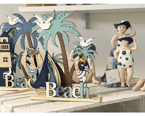 Figures décoratives en bois avec motifs de plage tels que phare, voilier, palmiers et mouettes