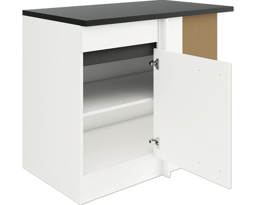 Meuble bas avec porte ouverte et étagère