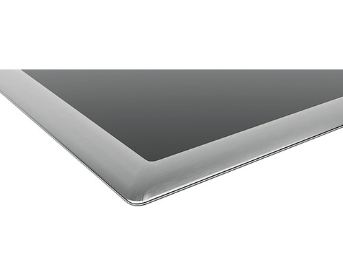 Vue détaillée d''une plaque de cuisson vitrocéramique avec cadre en acier inoxydable