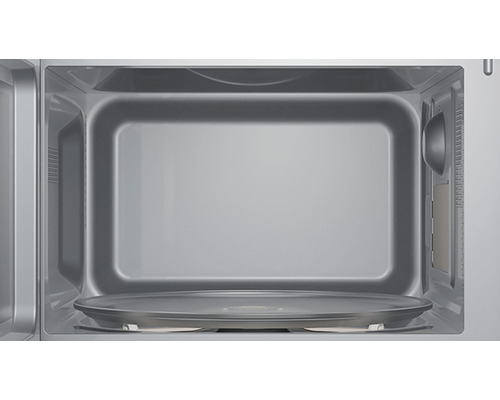 Intérieur d''un micro-ondes avec plateau tournant