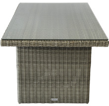 Gartentisch mit Glasplatte und Rattanstruktur