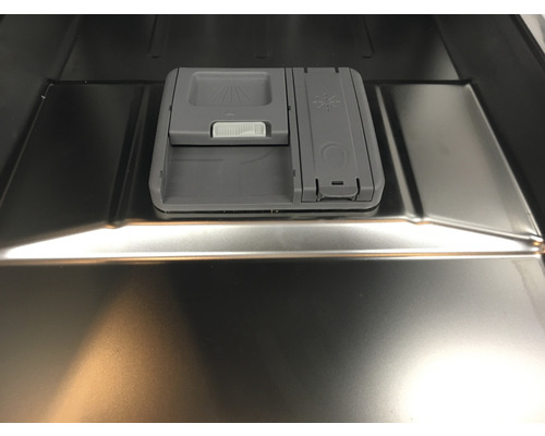 Intérieur d''un lave-vaisselle avec un compartiment pour détergent