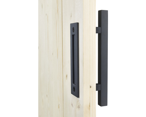 Ferrure de porte coulissante en métal sur un vantail de porte en bois