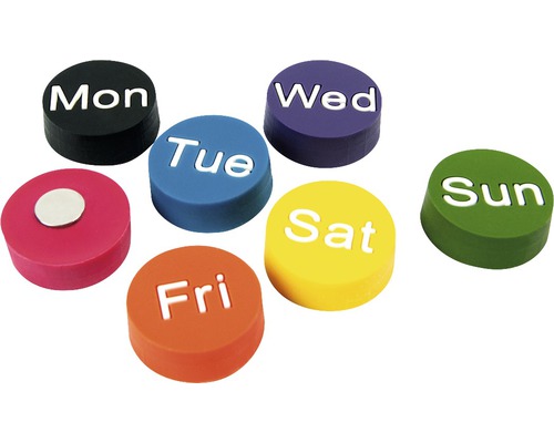 Sept aimants ronds avec les jours de la semaine