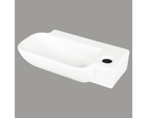 Weisses Keramik-Waschbecken mit Hahnloch