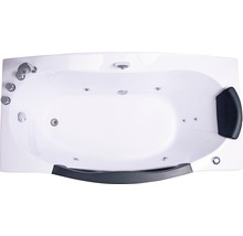 Baignoire blanche avec fonction tourbillon, robinetterie et appui-tête.