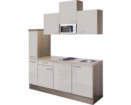 Cuisine complète avec éléments hauts et bas, évier, plaque de cuisson et micro-ondes