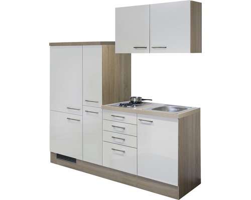 Cuisine compacte avec évier, plaque de cuisson, armoires et tiroirs