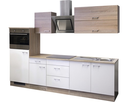 Cuisine moderne avec appareils électriques, évier et hotte aspirante