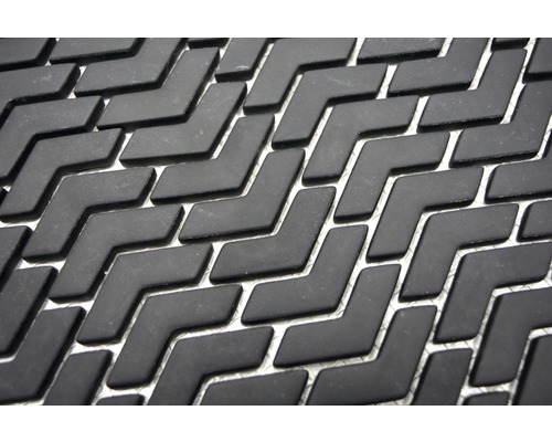 Gros plan d''un tapis de sol avec un motif de flèche.