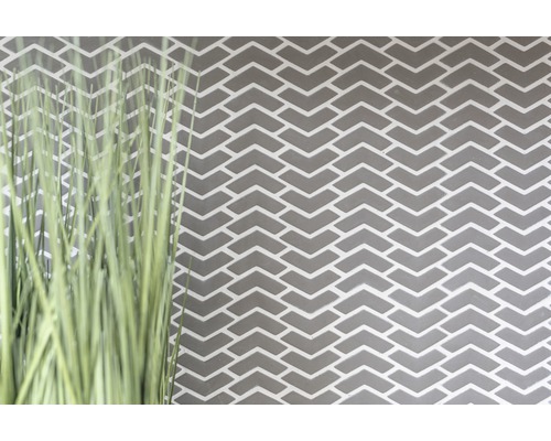 Mur avec motif de briques et graminées ornementales