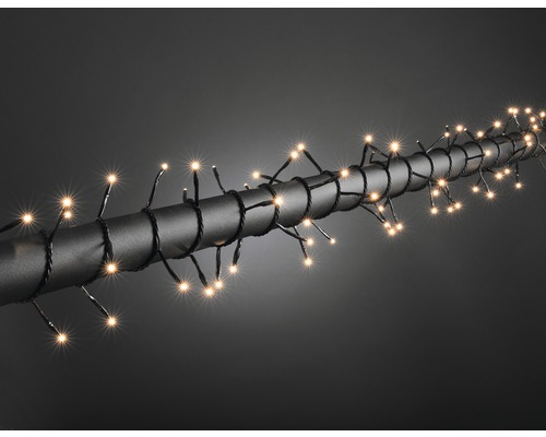 Guirlande lumineuse LED Konstsmide micro extérieur et intérieur 120 LED blanc chaud câble noir Guirlande lumineuse avec LED blanc chaud sur câble noir