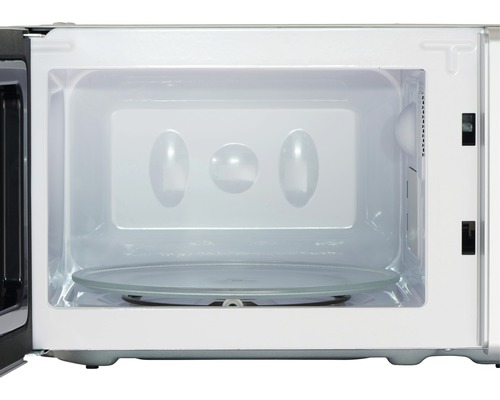 Intérieur d''un four à micro-ondes avec plateau tournant