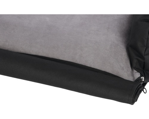 Gros plan d''un lit pour chien avec fermeture éclair