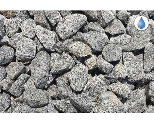 Gros plan de gravier décoratif en granit avec symbole de perméabilité à l''eau