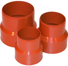 Drei Kunststoff-Reduzierstücke für Rohre