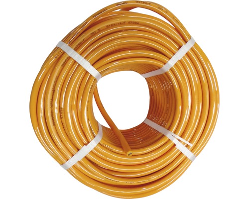Tuyau de gaz jaune enroulé et fixé avec des bandes.