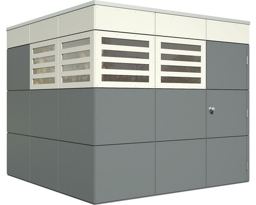 Bâtiment gris et crème avec porte et grilles de ventilation.