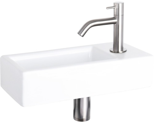 Weisses Waschbecken mit Armatur