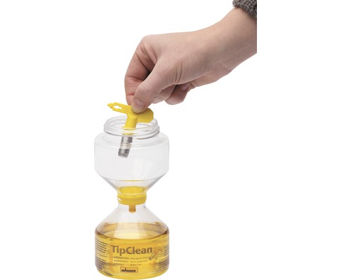 Conteneur de nettoyage de buse de pulvérisation TipClean en cours d''utilisation
