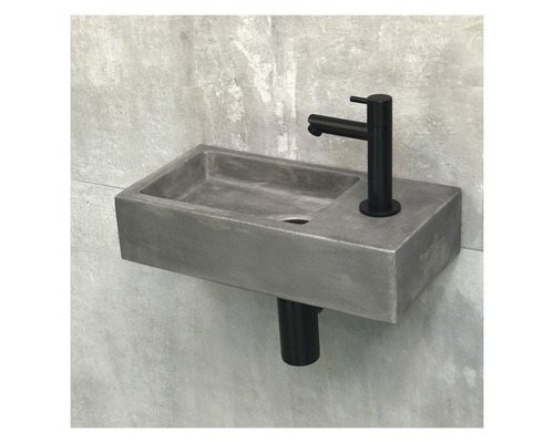 Aufsatzwaschtisch aus Beton mit Armatur