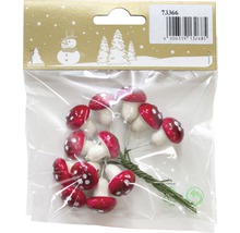 Verpackung mit Dekorations-Fliegenpilzen