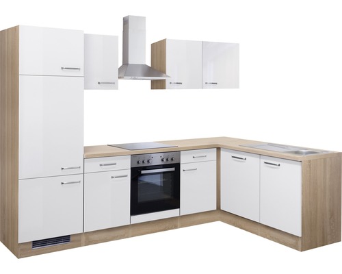 Cuisine moderne avec façades blanches, plan de travail imitation bois et hotte aspirante.