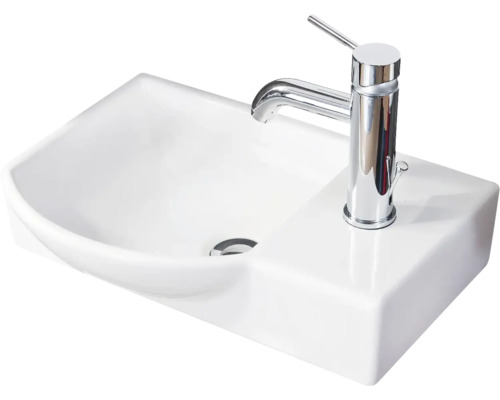 Rechteckiges Waschbecken aus Keramik mit Armatur