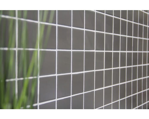 Gros plan d''une mosaïque grise avec des joints