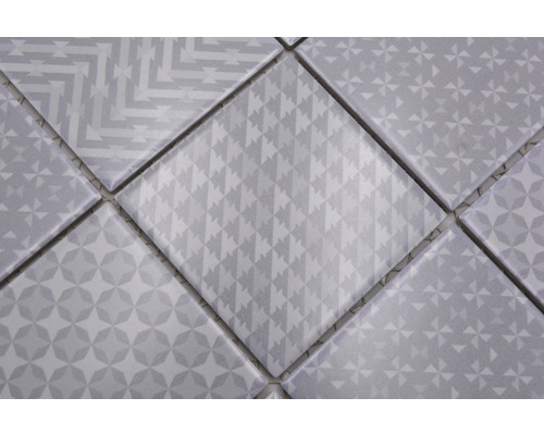 Gros plan de carreaux avec motifs géométriques