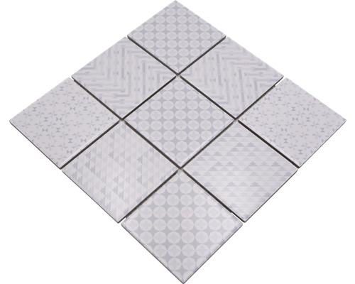 Muster aus neun quadratischen Fliesen mit verschiedenen geometrischen Designs