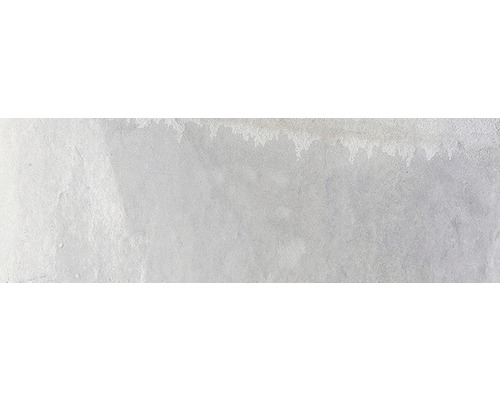 Mur en béton gris avec texture irrégulière