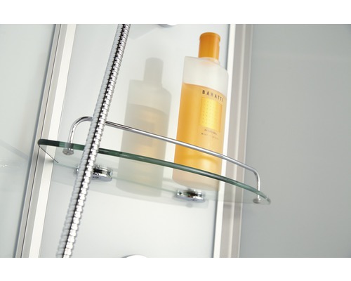 Étagère de douche avec flacon de shampooing sur une paroi de douche
