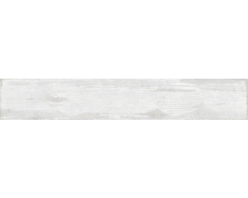 Weisse Wandfliese in Holzoptik.