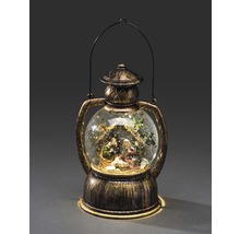 Boule à neige de Noël avec crèche dans une lanterne