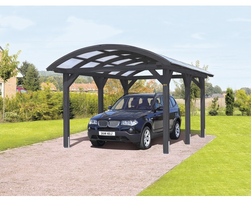 Carport pour un véhicule SKAN HOLZ toit incurvé, 376x541 cm, gris ardoise Une voiture sous un abri ouvert avec des poutres en bois et un toit translucide.