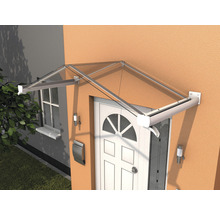 Eingangsbereich eines Hauses mit einer Vordachkonstruktion aus Metall und Glas.