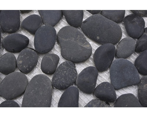 Pierres naturelles décoratives sur une grille pour l''aménagement paysager