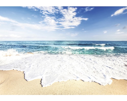 Papier peint panoramique intissé Meeresgischt bleu blanc 312 x 219 cm Scène d''une plage de sable avec des vagues et un ciel bleu