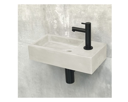 Aufputzwaschbecken aus Beton mit Armatur