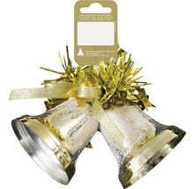 Goldene Weihnachtsglocken mit Schleife und Lametta als Dekoration