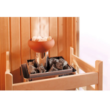 Poêle de sauna avec pierres de sauna et coupe d''évaporation dans un sauna