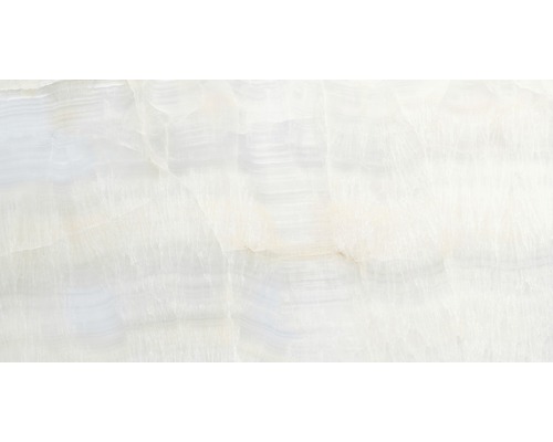 Carrelage pour murs et sols Dubai bleu clair 32 x 62,5 cm Gros plan d''une plaque de marbre onyx clair.