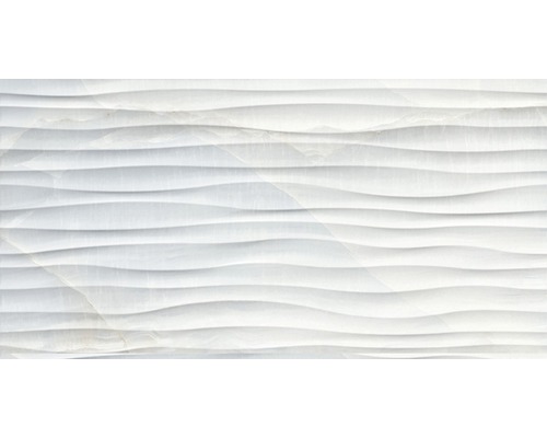 Weisse Wandfliese mit Wellenstruktur