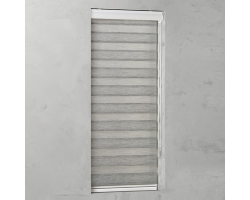 Store jour/nuit SOLUNA Ikaria D-R15 avec caisson blanc noir 60x175 cm Store enrouleur double fermé dans un cadre de fenêtre.