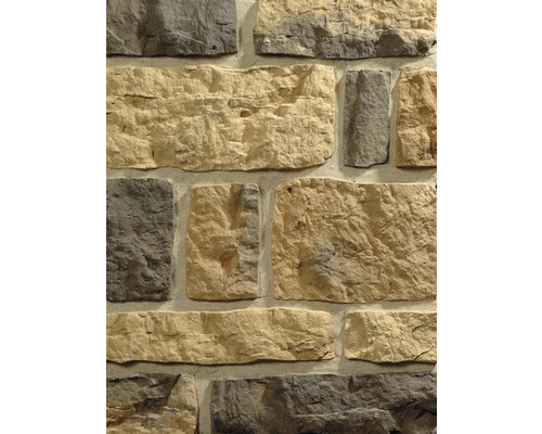 Revêtement plat Klimex Ardennes brun-nuancé Gros plan d''un revêtement mural avec des pierres de différentes tailles et formes