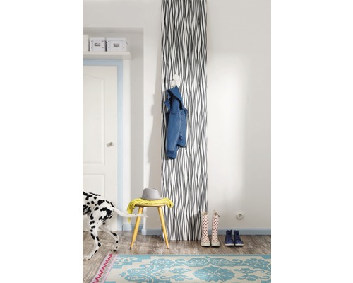 Hall d''entrée avec radiateur, chaise et tapis