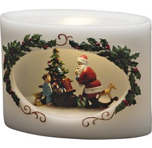 Bougie LED décorative avec Père Noël, sapin de Noël, enfant et cadeaux comme décoration festive.