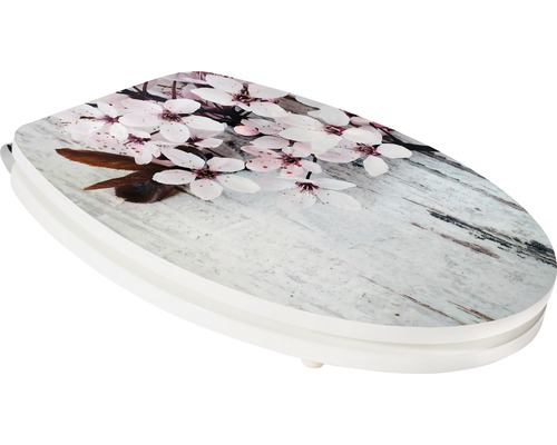 Abattant de WC avec motif floral sur aspect bois