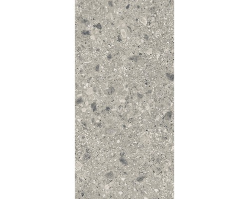 Gros plan d''un carreau de sol aspect terrazzo.